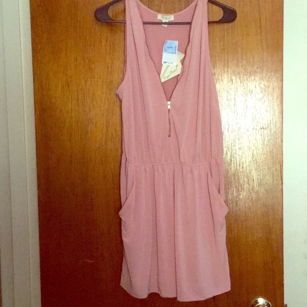 Pink zipper romper. Never worn. NWT.
